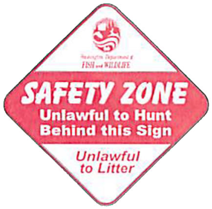SAFETY ZONE - Unlawful to Hunt behind this Sign